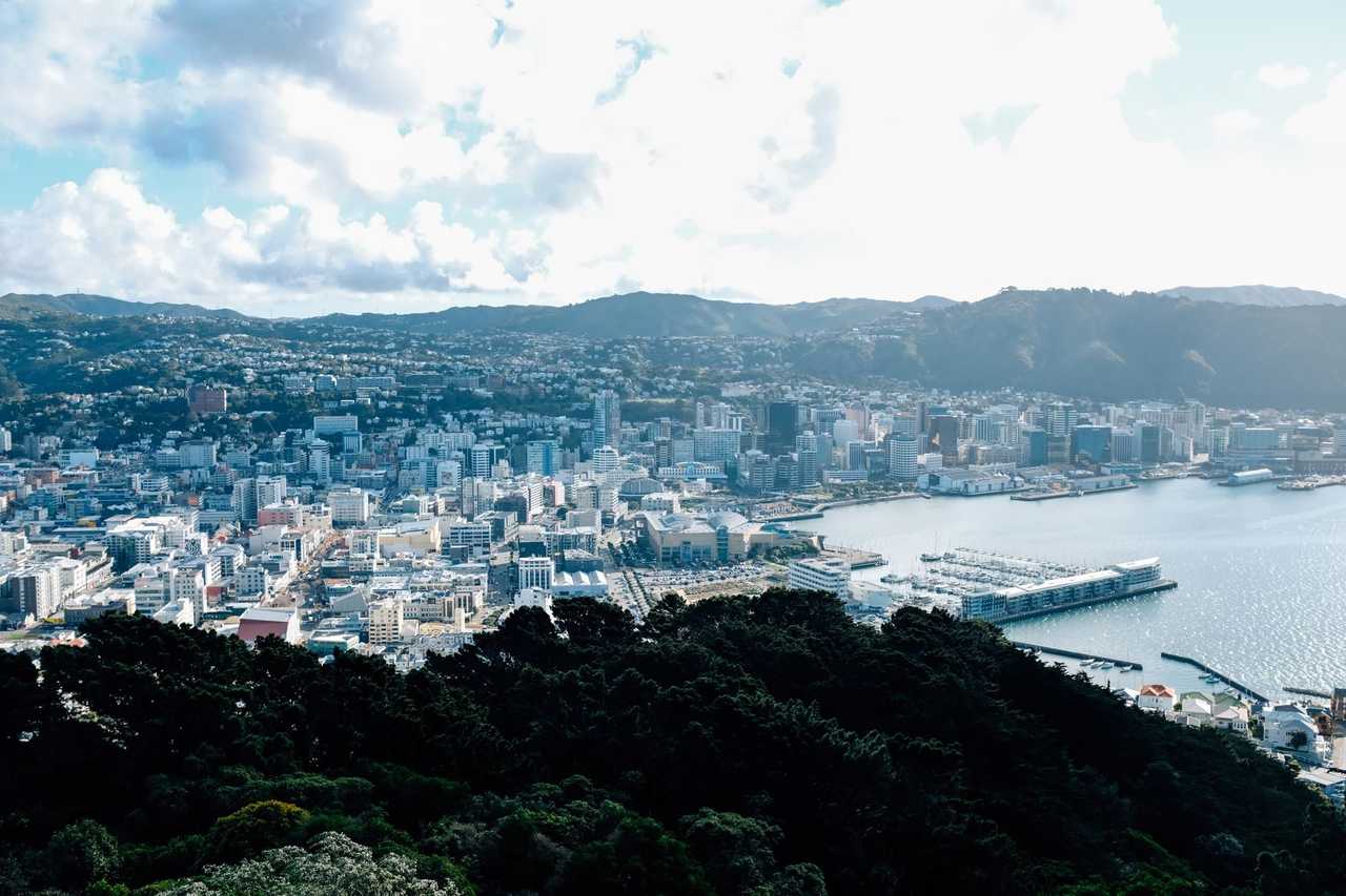 Wellington harbour, Te Papa and CBD from elevated lookout, day, blue sky with clouds