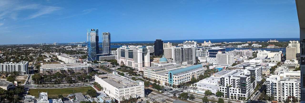 West Palm Beach skyline panorama toward the Intracoastal, day, vibrant blue sky