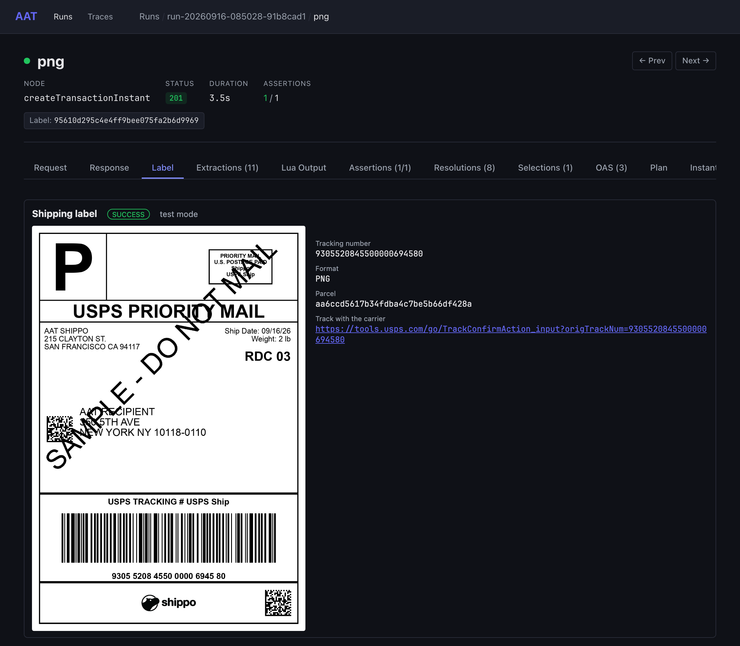A purchased label rendered in the web UI, with its tracking number and carrier link
