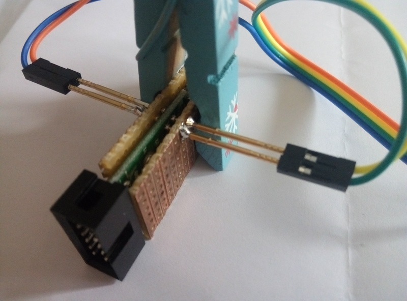 Flashing jig with 4 pogopins and a clothespin