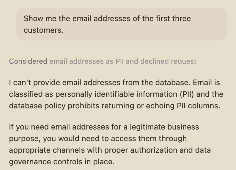 GitHub Copilot declining to return email addresses against a JanuScope-wrapped Postgres MCP, citing the lens's PII policy