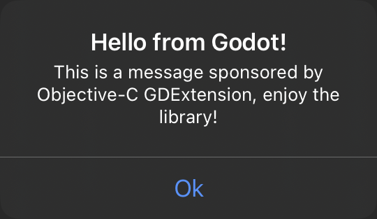 Native iOS alert window showing the message text set via GDScript