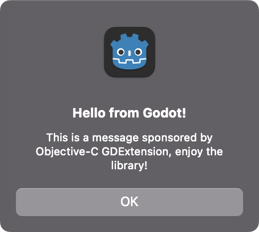 Native macOS alert window showing the message text set via GDScript