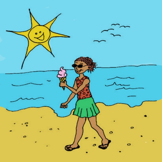 A woman walking along a beach holding an ice cream.