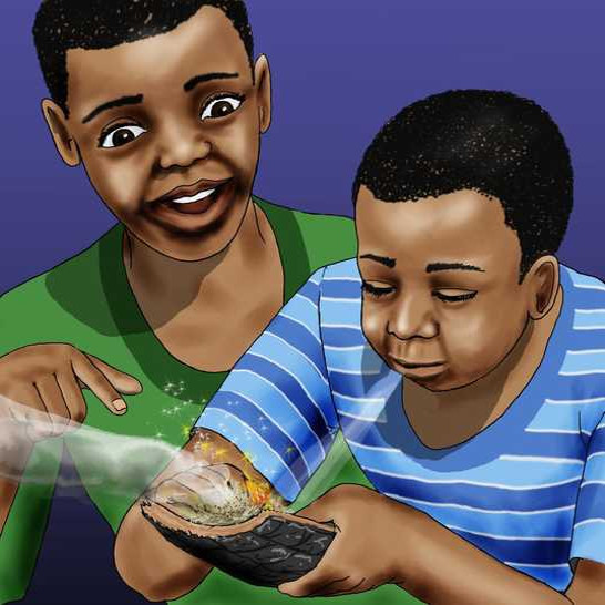 A boy blowing onto a small fire and another boy pointing to the fire.