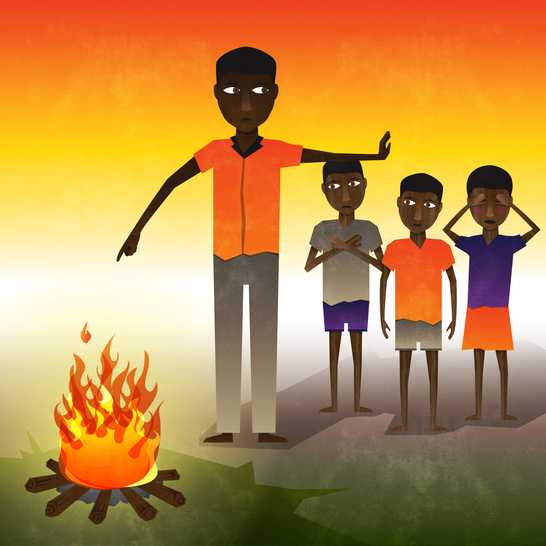 A man standing in front of a campfire holding his hand up and three boys standing next to him.