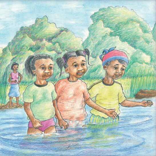 Children standing in a line, in a river.