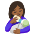 woman feeding baby: medium-dark skin tone emoji on Google