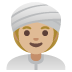 woman wearing turban: medium-light skin tone emoji on Google