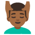 man getting massage: medium-dark skin tone emoji on Google