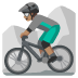 man mountain biking: medium skin tone emoji on Google