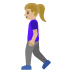 woman walking: medium-light skin tone emoji on Google