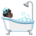 person taking bath: dark skin tone on Google