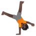 person cartwheeling: dark skin tone on Google