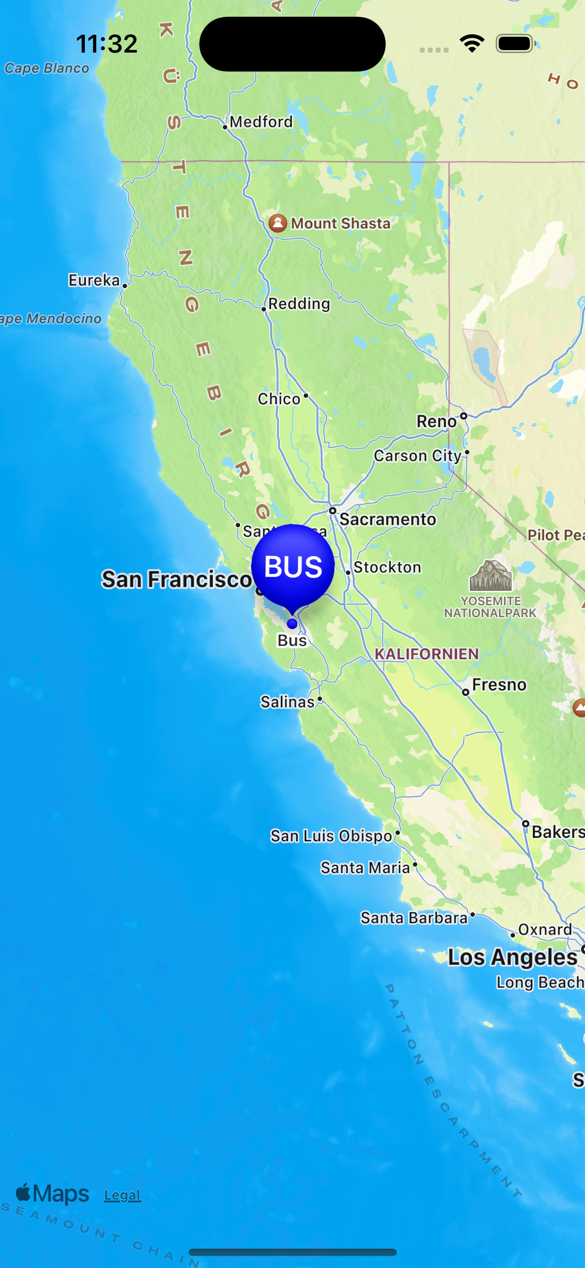 Screenshot of the app with a map, which has a single selected annotation with a blue big marker displaying the text BUS.
