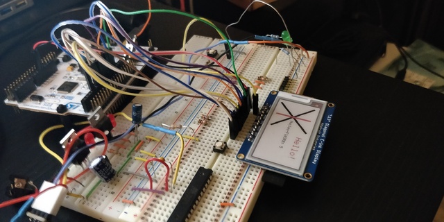 Photo of Adafruit 2.13 eink display on Nucleo-F103RB
dev board