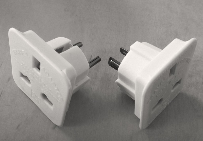 "Plug adaptors" by dogwelder is licensed under CC BY-NC 2.0