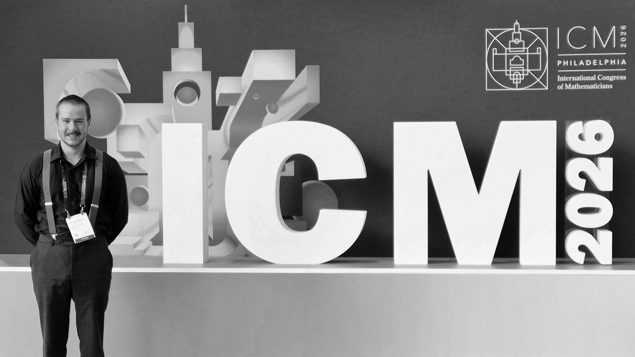 Photo in front of ICM logo
