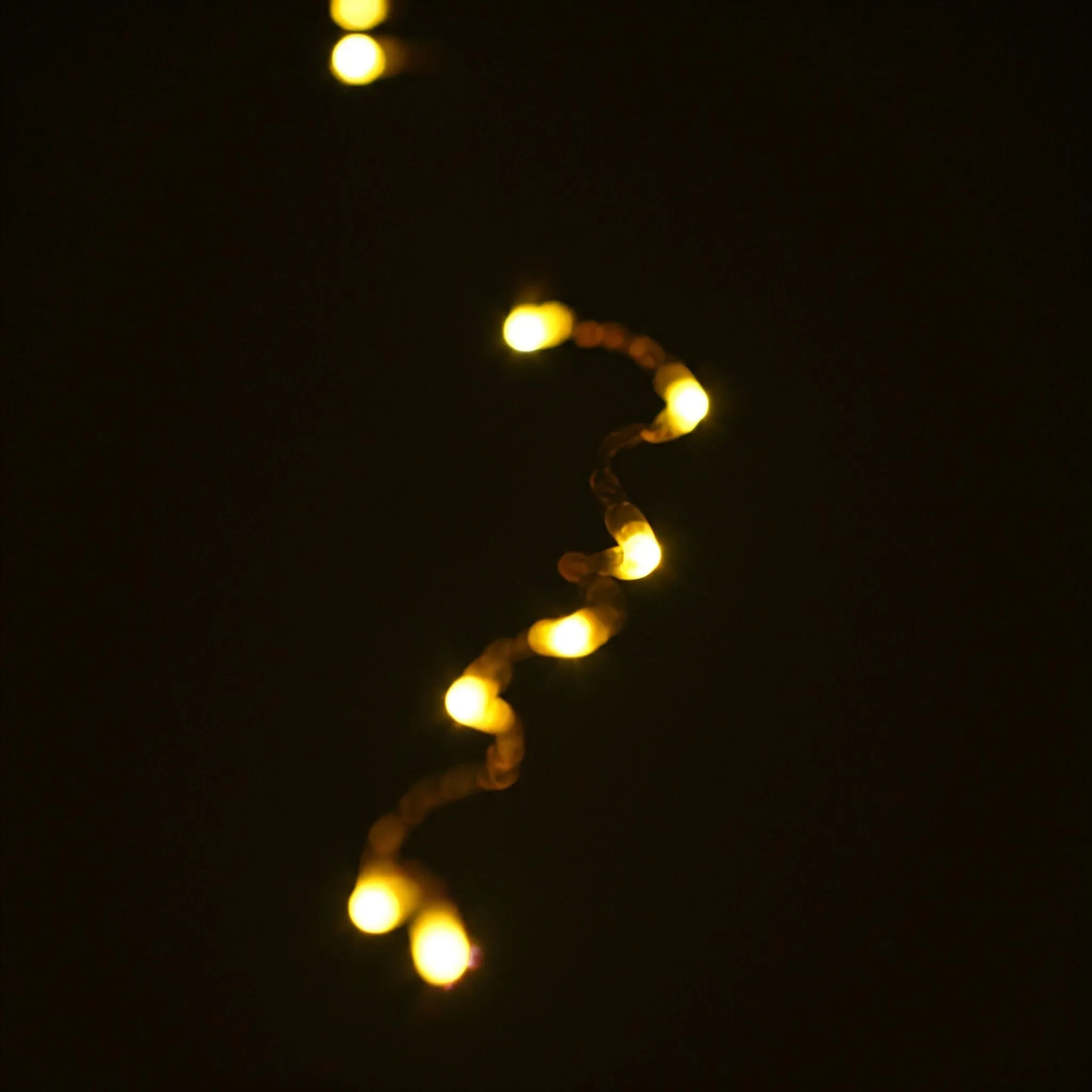 A string where palindromic substrings glow softly, each valid palindrome softly illuminated.