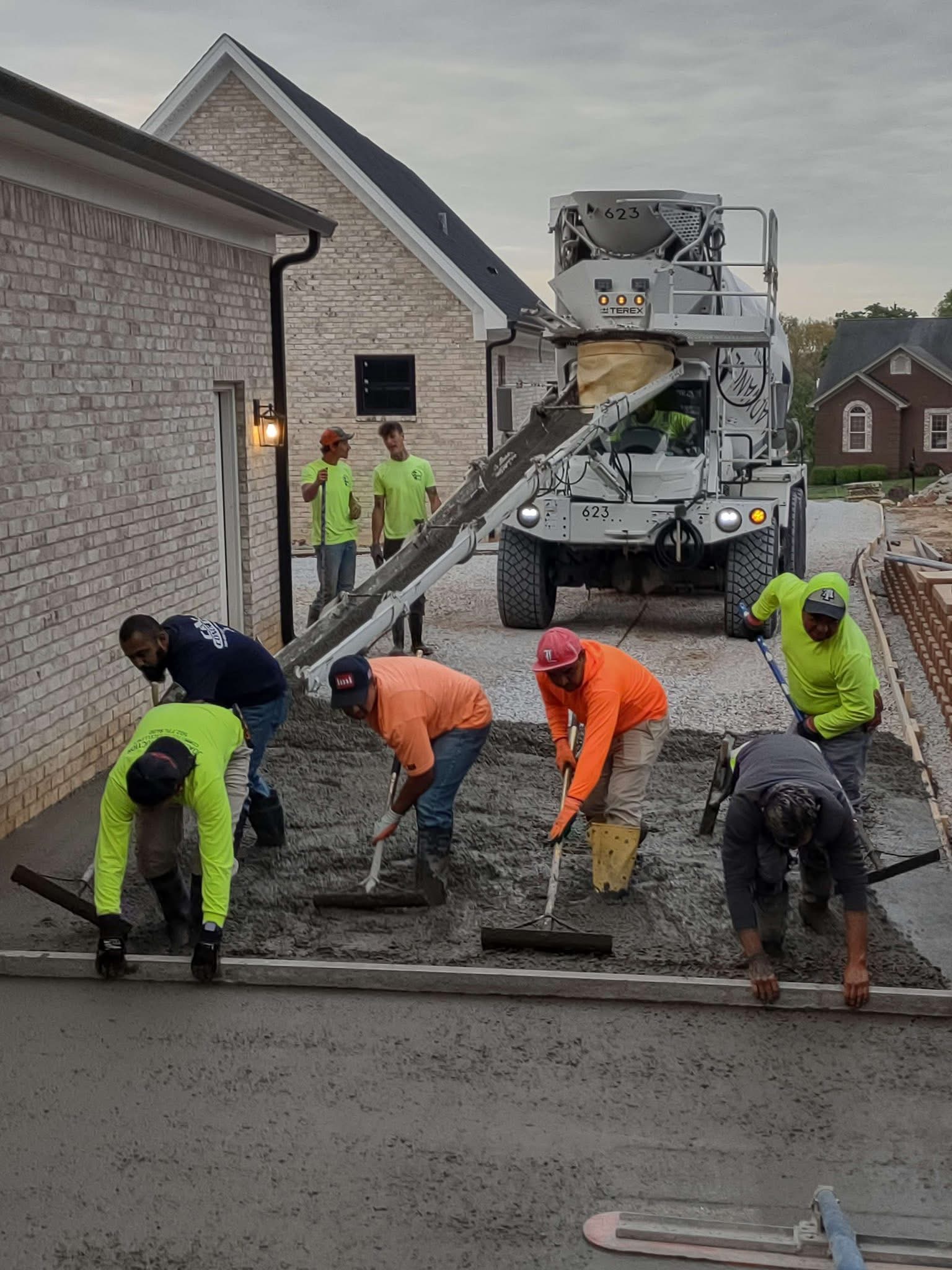 Concrete crew pouring slab