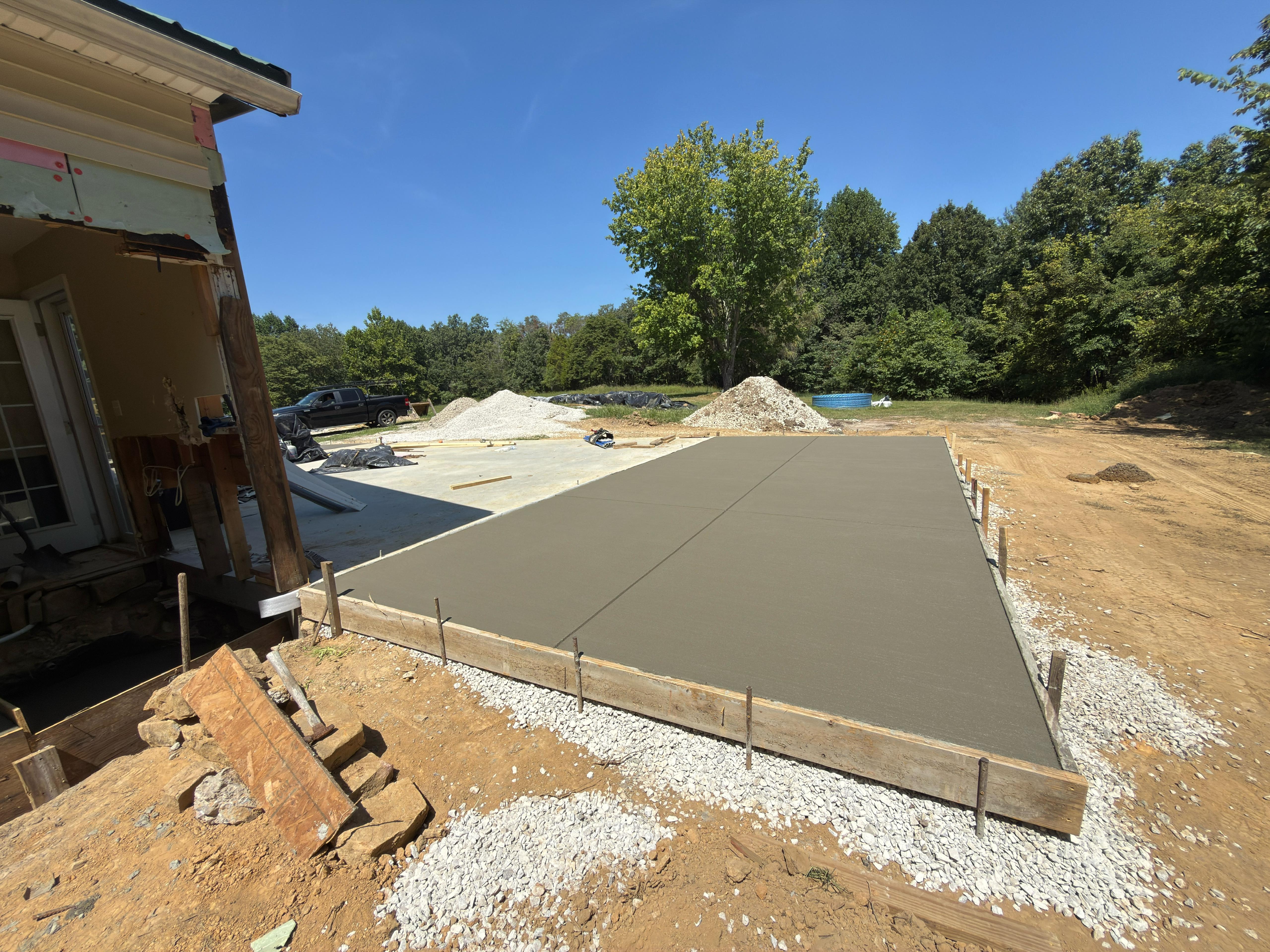 Overhead view of concrete slab pour — MG Concrete LLC