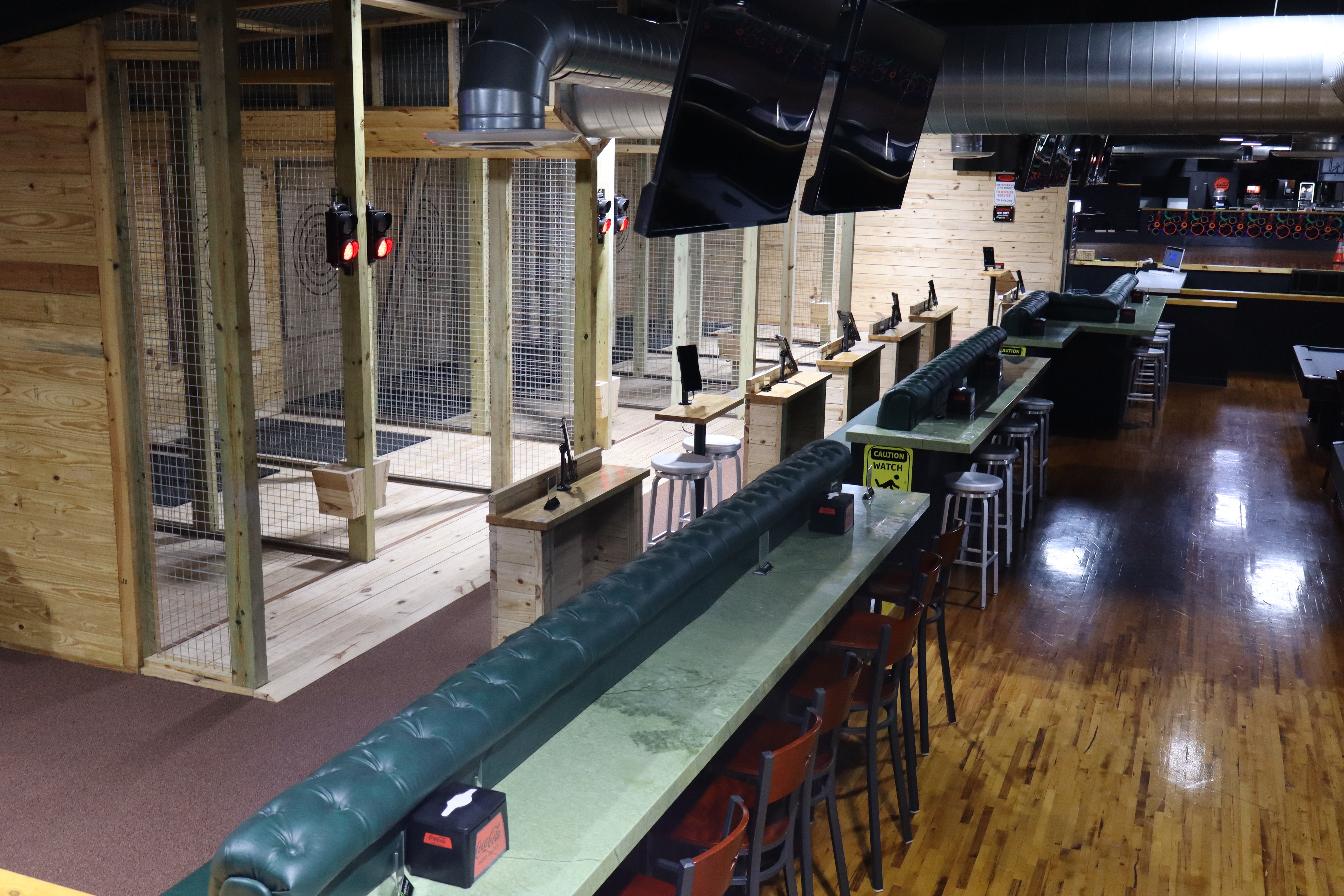 Axe throwing area and bar seating