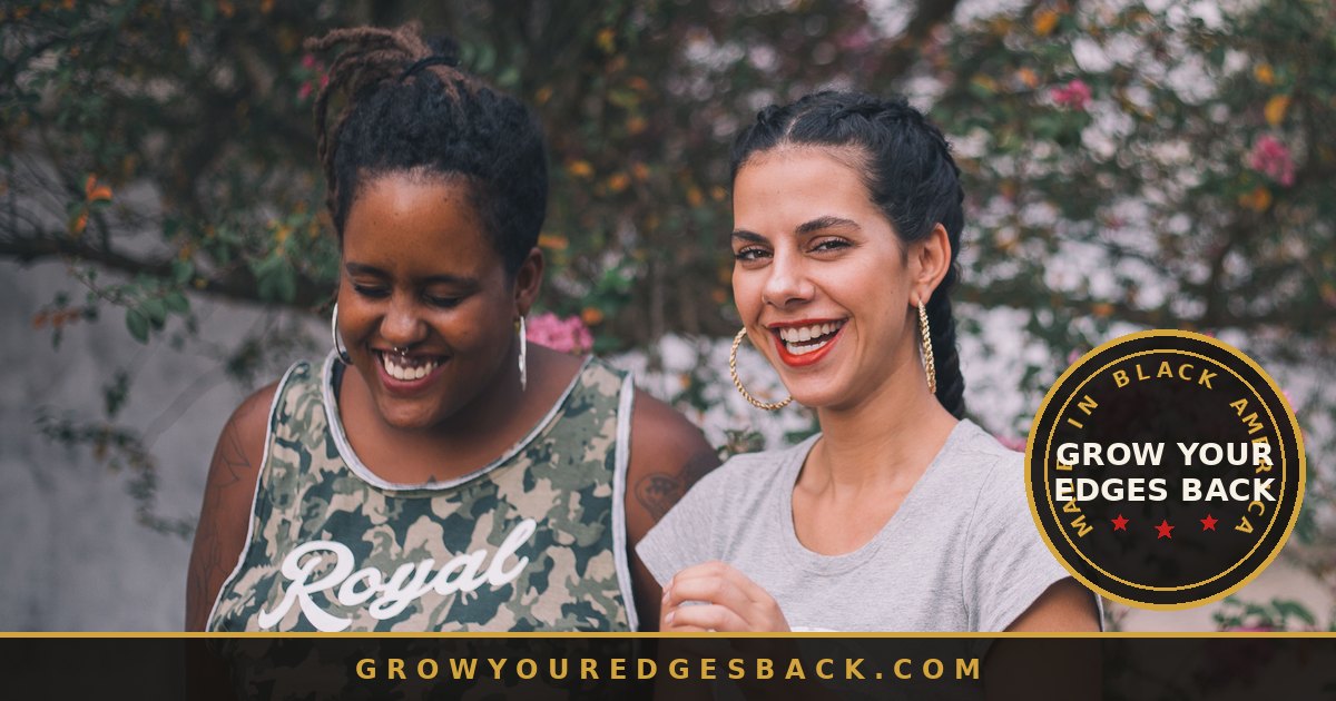 Two women laughing together outdoors, natural hair - Grow Your Edges Back