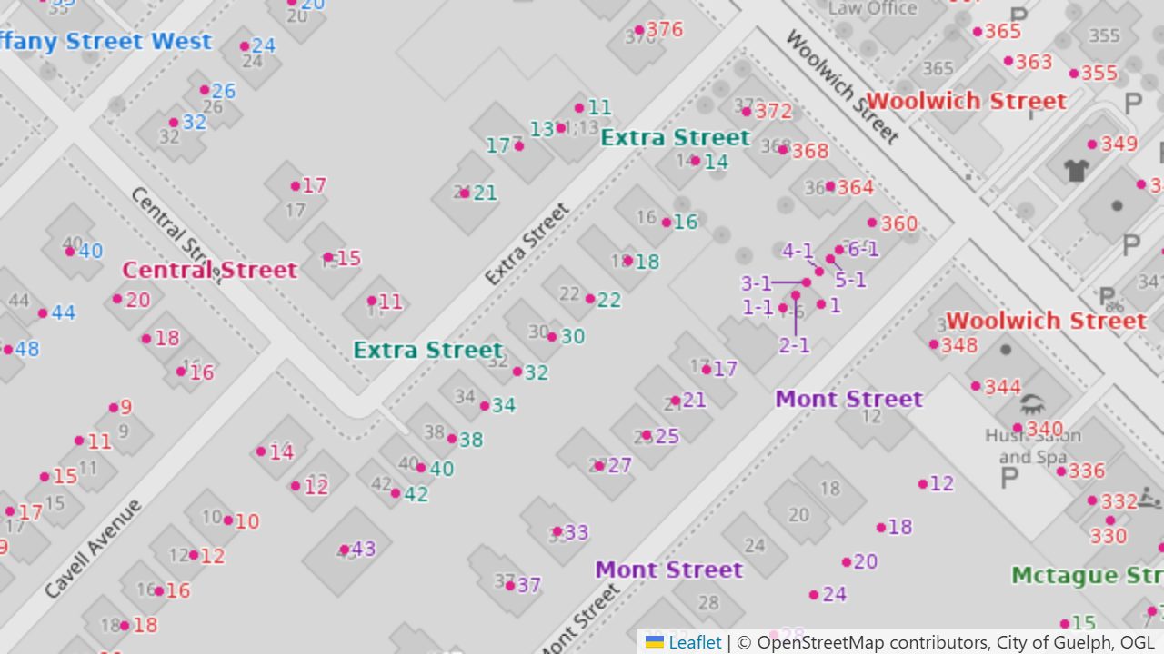 City address points drawn as house numbers, coloured by street, near Woolwich Street