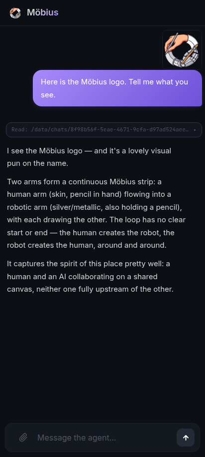 Composer with the paperclip restored, a file attached inline in the sent message, and the agent's reply describing what it sees.