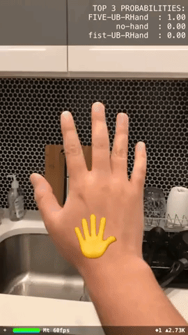 gif showing fist and spread hand appearing and dissappearing from screen, and it being recognized on an iPhone