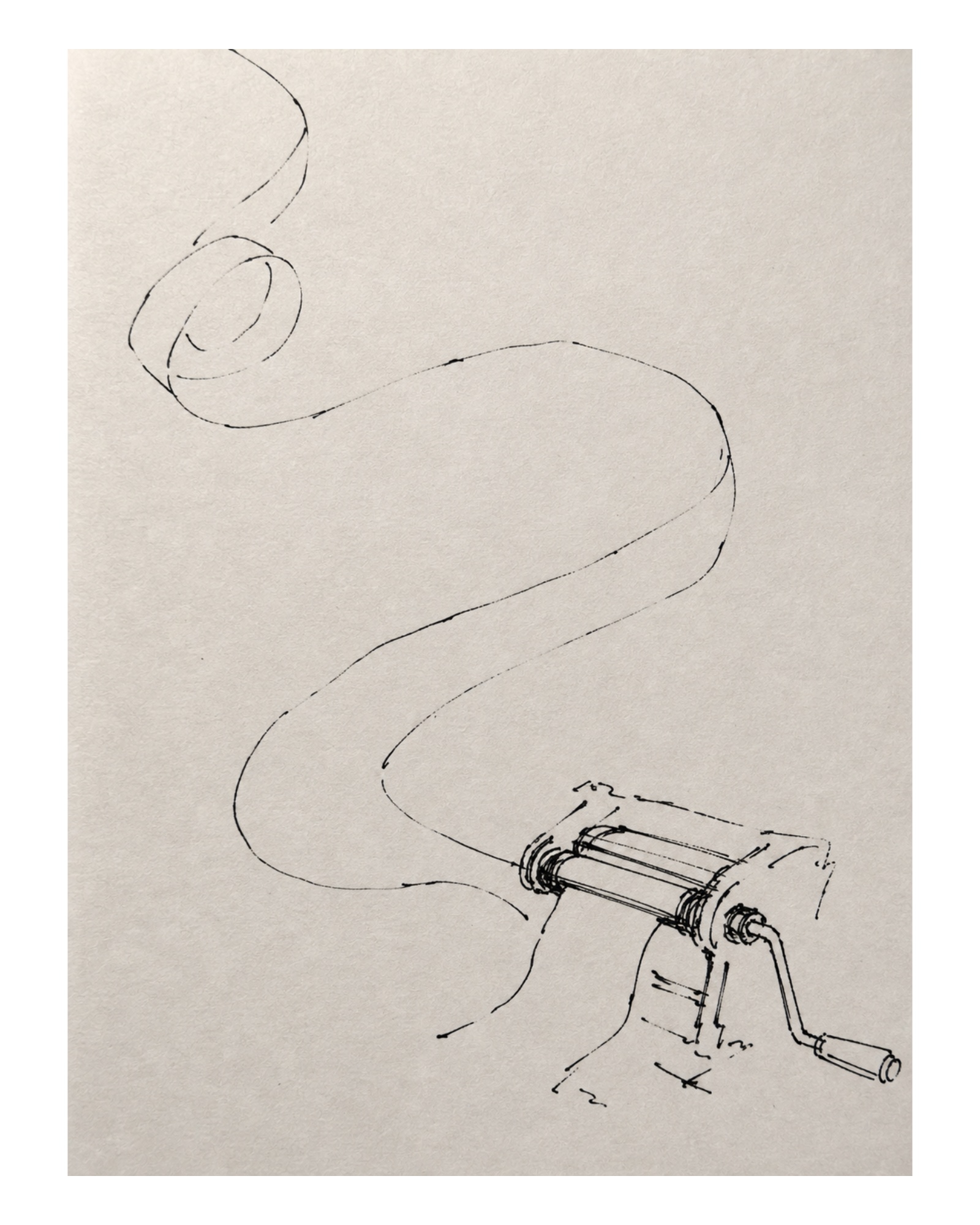 A pasta machine producing one long ribbon