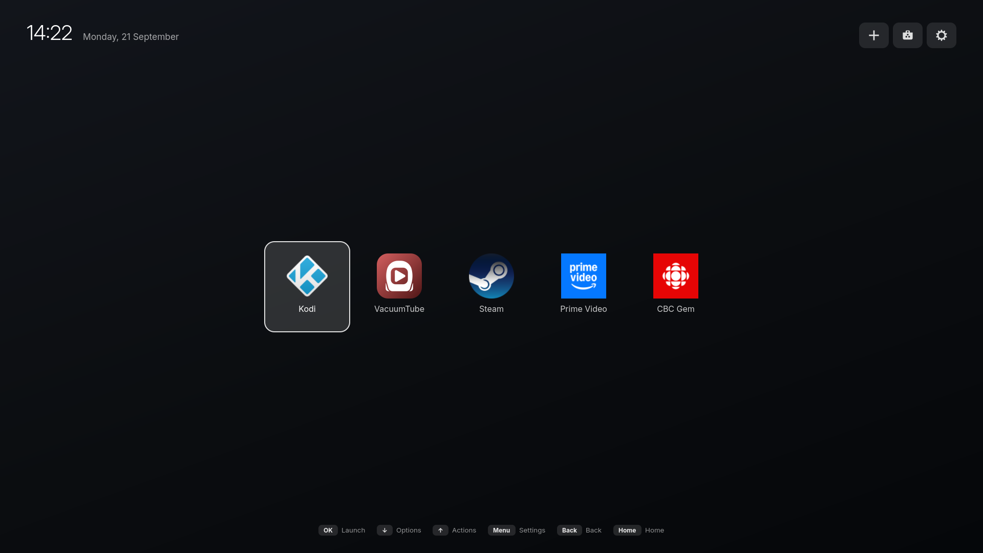 The HDLounge home screen: a fullscreen background image with a clock and a row of app tiles