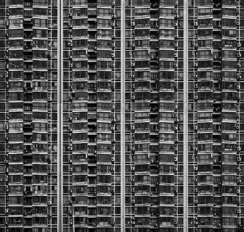 []{#c10752_006.xhtml#fig_019}[[Figure 6.19](#c10752_006.xhtml#fig_019a)]{.figureLabel} A Shanghai high-rise apartment building with air conditioners for virtually every room (Corbis).