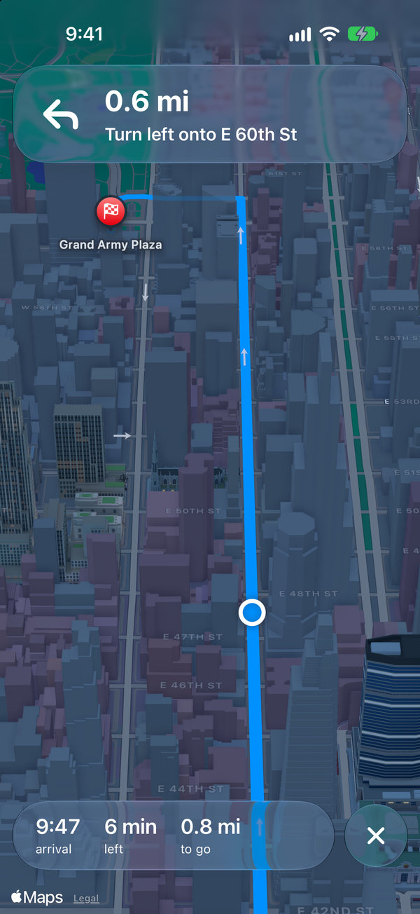 Navigation: glass over a live map, dark mode