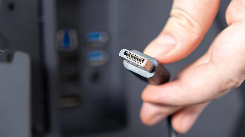 A regular-size DisplayPort cable.