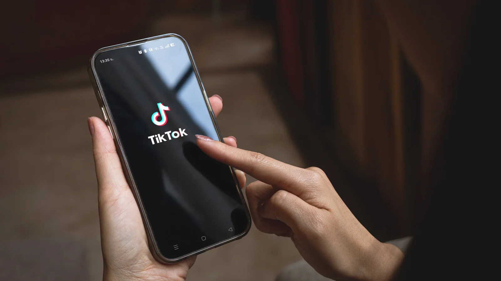 TikTok logo on a phone.