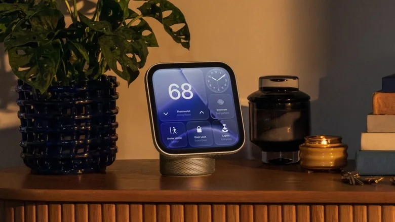 Apple's HomeView on its regular base, sitting on a table.