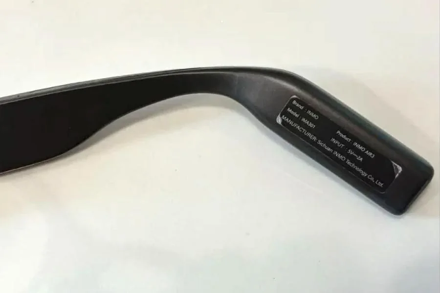 A close-up of the right temple label on the Inmo Air3 smart glasses.
