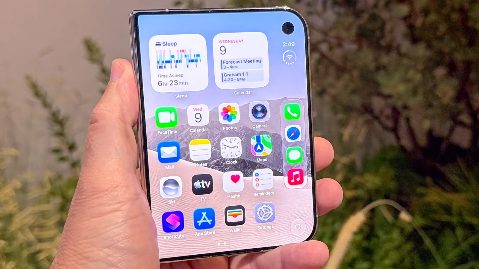 Apple iPhone Duo shown in hand