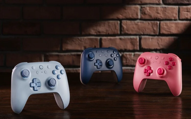 Three colors of the Ultimate 2C controller.