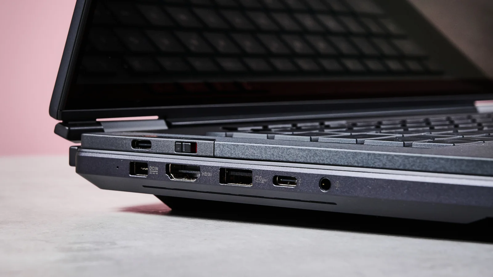 Close-up of ports on left-hand side of ASUS ROG Zephyrus Duo 2026 with pink wall in background