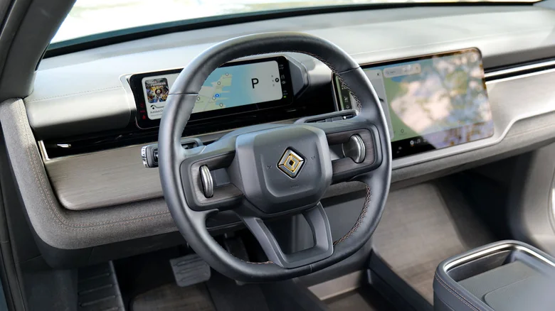 The steering wheel and driver's display on the Rivian R2.