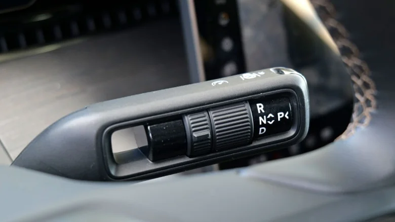 A traditional gear stalk almost seems like a quaint inclusion on an EV in 2026.