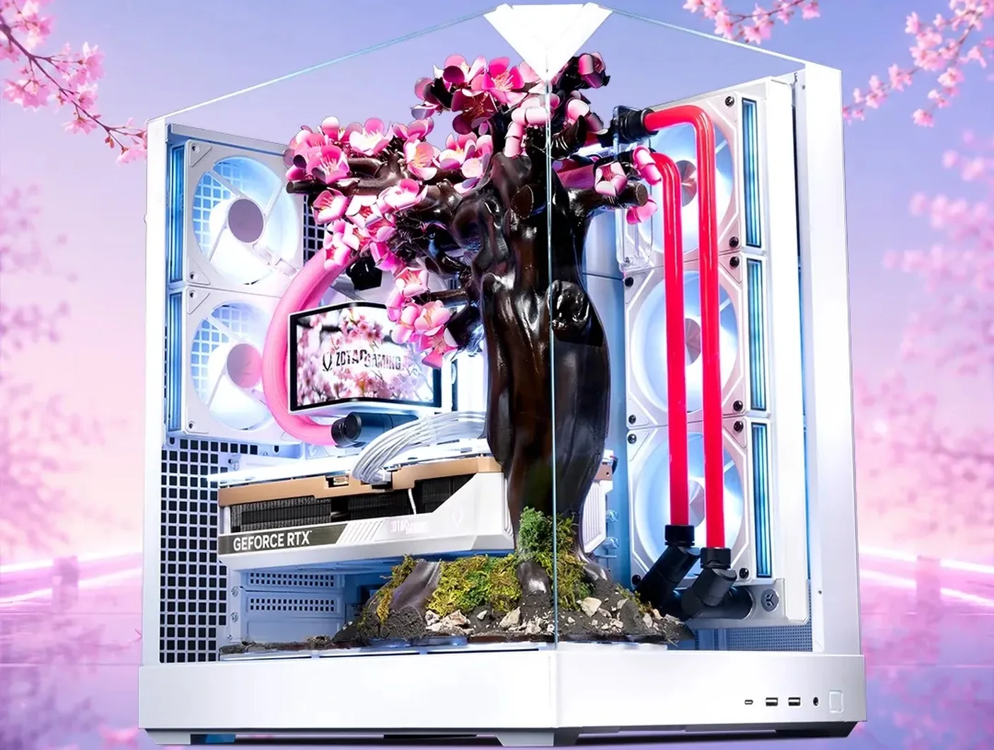 A photo of the Cherry Blossom PC from an angle, showing the water-cooling pipes.
