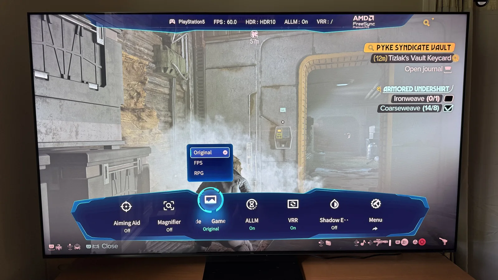 TCL QM7L's game bar is active during a playthrough of Star Wars: Outlaws