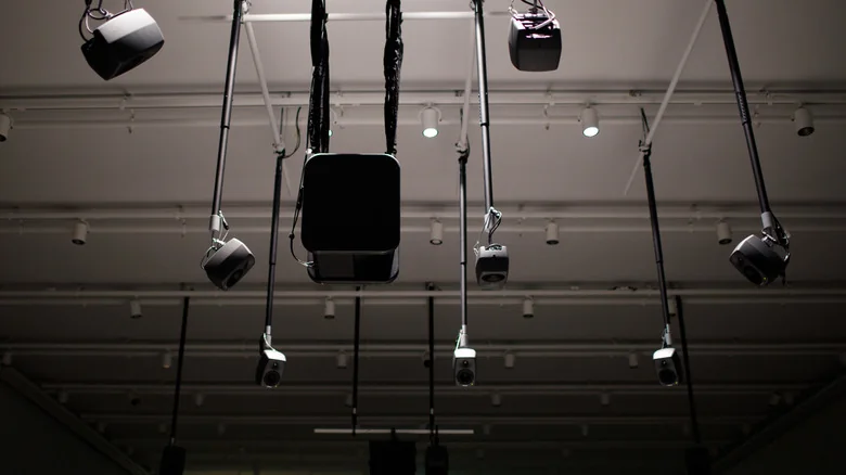 A nest of ceiling satellites for a Dolby Atmos system.