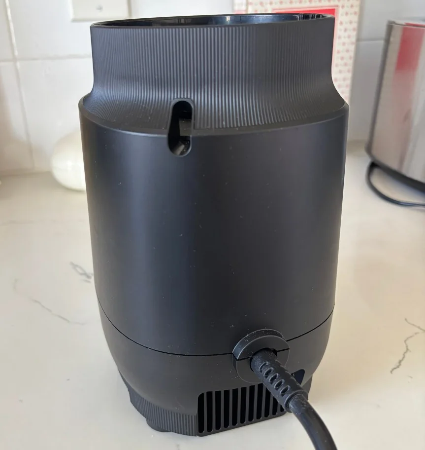 The back of the black Vitamix Nano personal blender.