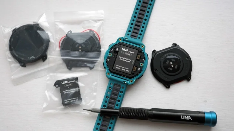 Una Watch and a number of new spare parts in bags.