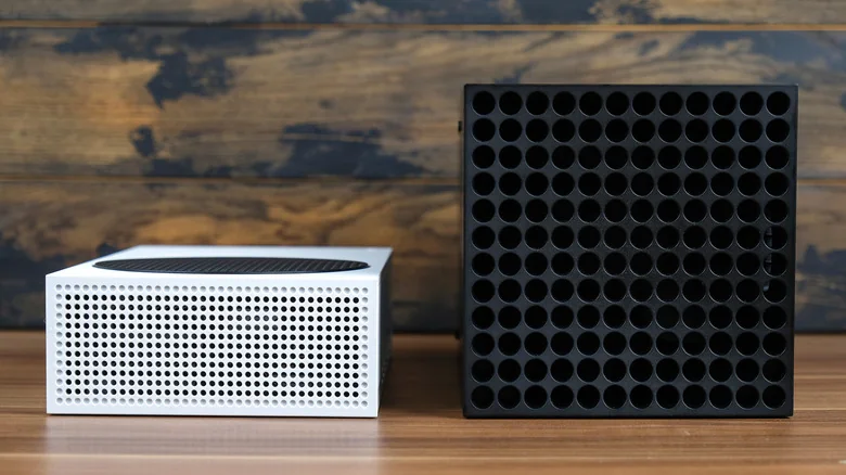 A white Xbox Series S and a black Xbox Series X, side-by-side.