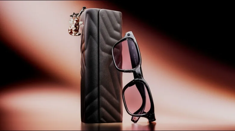 Meta Adventurer LISA Edition glasses leaning against a custom charging case.